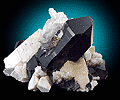 Mineral specimen: Quartz var. Smoky with Albite from Oliver Diggings, Middle Moat Mtn., Hales Location, New Hampshire.