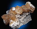 Mineral specimen: Calcite with Quartz from Benchmark NY Quarry, St. Johnsville, New York.
