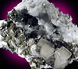Mineral specimen: Calcite, Pseudo-cubic, on Datolite from Millington Quarry, Millington, New Jersey.