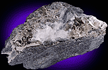 Mineral specimen: Pyrite and Stilbite in Calcite vein from Harlem Meer, Central Park, Manhattan Island, New York City, New York.
