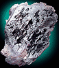 Mineral specimen: Spodumene altered with Quartz / Hydroxyl-Herderite from Tamminen Quarry, Greenwood, Maine.