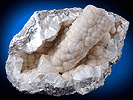 Mineral specimen: Pectolite with Calcite and Prehnite from Millington Quarry, Millington, New Jersey.