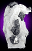 Mineral specimen: Franklinite in Calcite from Sterling Hill Mine, Ogdensburg, New Jersey.