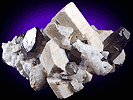 Mineral specimen: Quartz var. Smoky on Cleavlandite and Microlcline from Oliver Diggings, Middle Moat Mtn., Hales Location, New Hampshire.